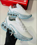Nike Air Max Dn White Blue – pair held in hand showing side profile
